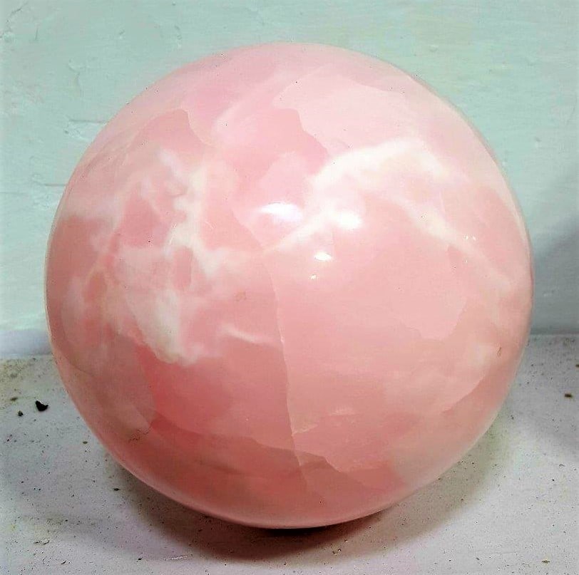 Big Size Pink Calcite Sphere - 6 kg: Big Size Pink Calcite Sphere - 6 kgShipping Rate: $150.00 .shipping rates are determined by Parcel weight and destination.Combined shipping: We offer combine shipping on multiple items purchased to re