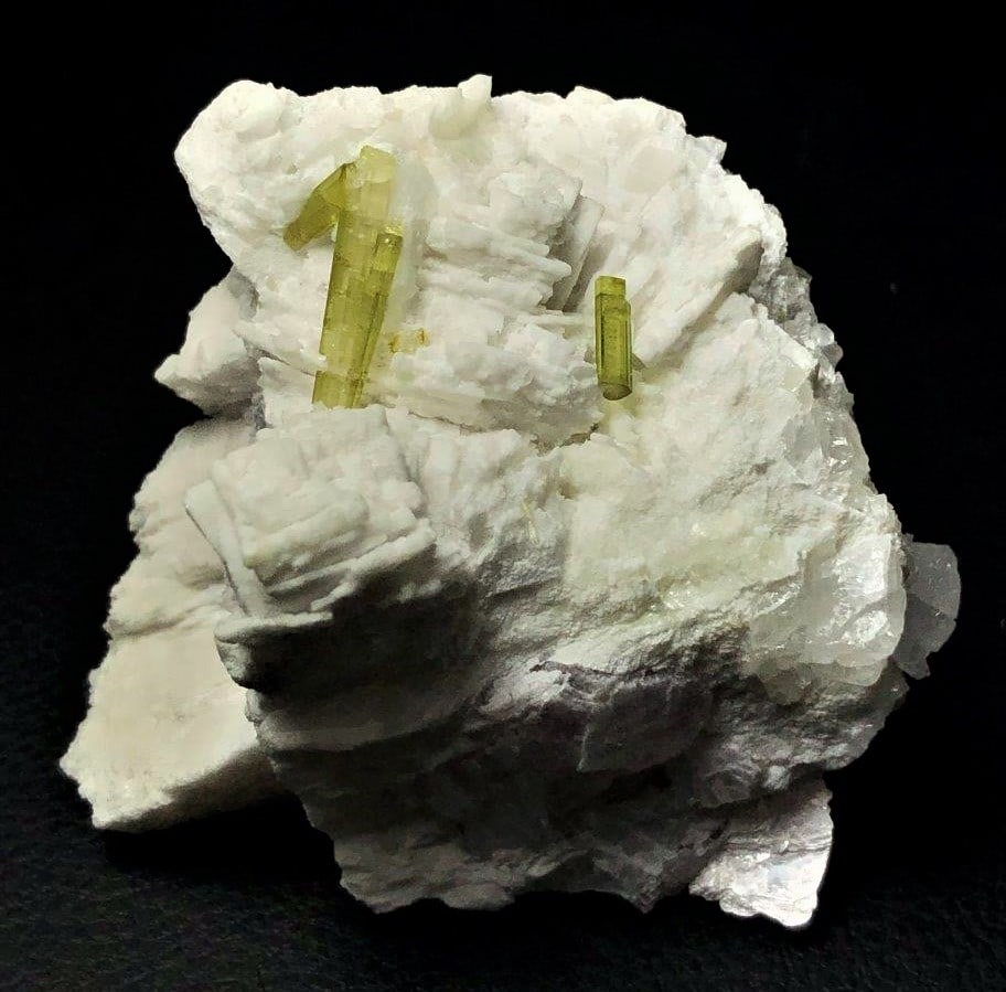 240 Grams Green tourmaline With Feldspar: 240 Grams Green tourmaline With Feldspar - 82X72X52 mmShipping Rate: $36.00 .shipping rates are determined by Parcel weight and destination.Combined shipping: We offer combine shipping on multiple ite