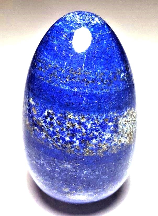 423 Grams Lapis Egg With Pyrite: 423 Grams Lapis Egg With PyriteShipping Rate: $45.00 .shipping rates are determined by Parcel weight and destination.Combined shipping: We offer combine shipping on multiple items purchased to reduce 