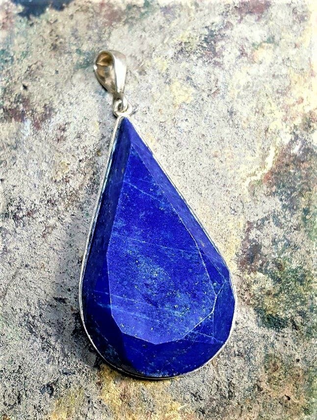 Tear Drop blue Lapis Pendant: Tear Drop Gift boxed blue Lapis Pendant - 46X25X7 mmShipping Rate: $23.00 .shipping rates are determined by Parcel weight and destination.Combined shipping: We offer combine shipping on multiple items
