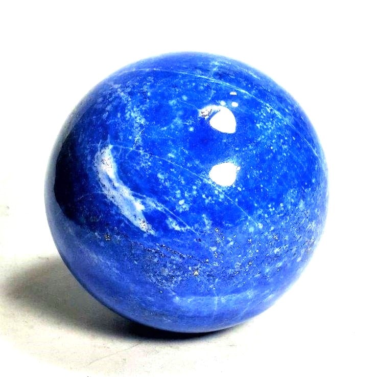 AAA Quality Deep Blue Lapis Lazuli Sphere - 677 Grams: Natural AAA Quality Deep Blue Lapis Lazuli Sphere - 677 Grams - Diameter 76 mmShipping Rate: $55.00 .shipping rates are determined by Parcel weight and destination.Combined shipping: We offer combine 