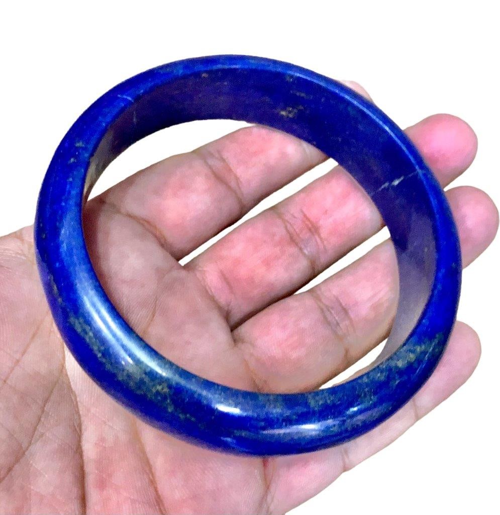 Top Quality Royal Blue Lapis Lazuli Bangle: Top Quality Royal Blue Lapis Lazuli BangleShipping Rate: $23.00 .shipping rates are determined by Parcel weight and destination.Combined shipping: We offer combine shipping on multiple items purchased