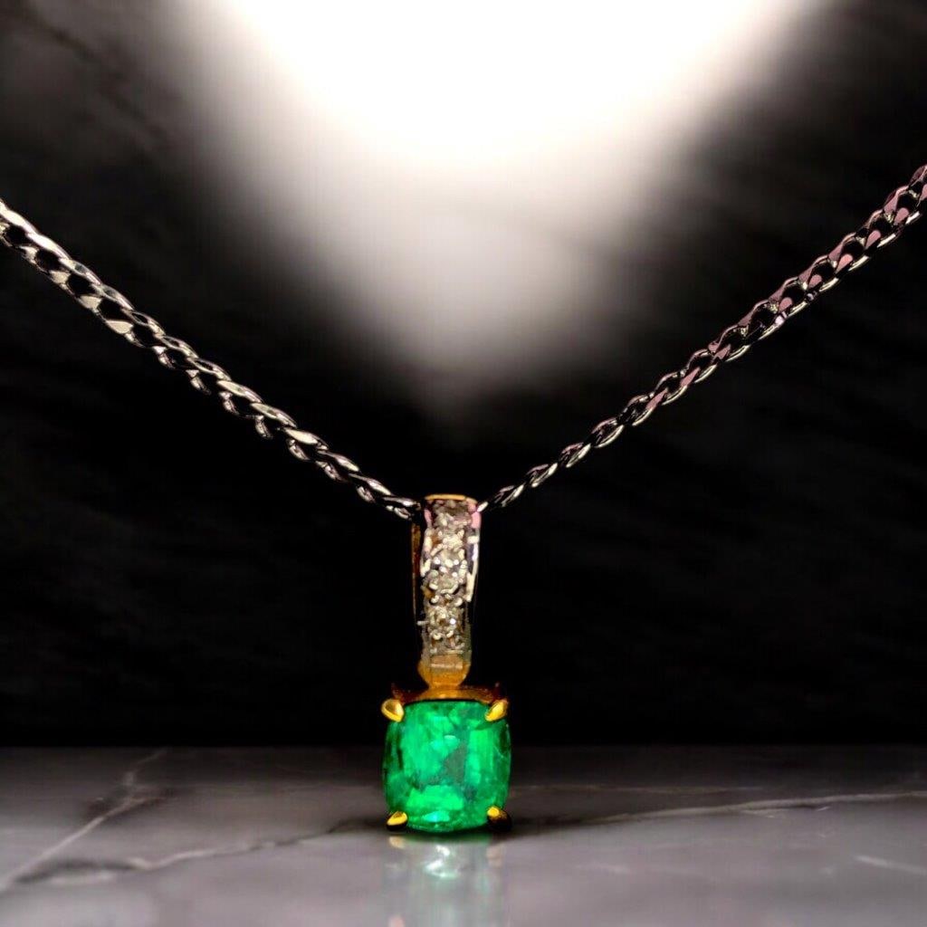 Emerald & Diamond Pendant Necklace ? Solid 18K Gold ? Natural Stones: Elevate your jewelry collection with this exquisite Emerald & Diamond Pendant Necklace, expertly crafted in solid 18K Gold. Featuring a vivid 1.30-carat natural emerald paired with a sparkling 0.15-ca