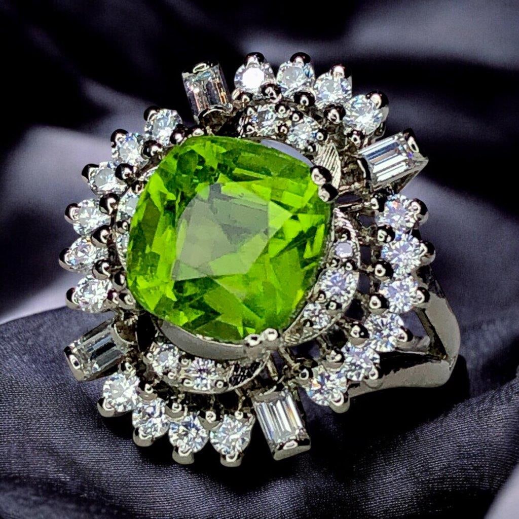 High-Quality 7up Peridot Ring in Sterling Silver ? Women?s Size 7.5: Top Grade 7up Colour Peridot RING in Pure Silver - Ring Size 7.5 US Stone Weight: 6.90 CaratsJewelry Weight: 7.20 GramsZircons: 1.5 CaratsMetal: Silver Choose design of your own and we will make it fo