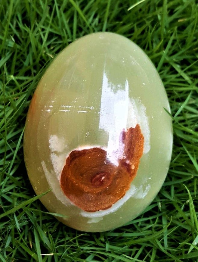 Pinkish Green Egg Onyx Stone - 253 Grams: Pinkish Green Egg Onyx Stone - 253 Grams - 69X52 mmShipping Rate: $36.00 .shipping rates are determined by Parcel weight and destination.Combined shipping: We offer combine shipping on multiple items 