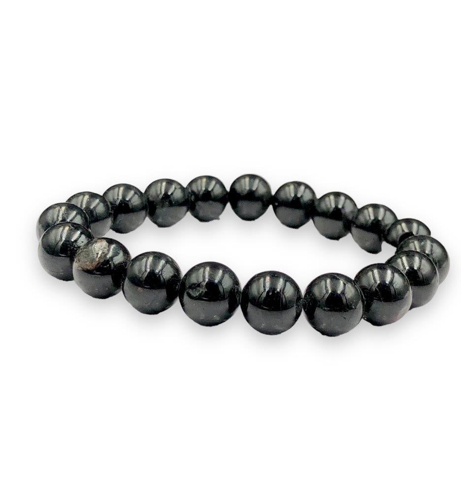 Fine Quality Natural Black Tourmaline Bracelet: Fine Quality Natural Black Tourmaline BraceletShipping Rate: $23.00 .shipping rates are determined by Parcel weight and destination.Combined shipping: We offer combine shipping on multiple items purch