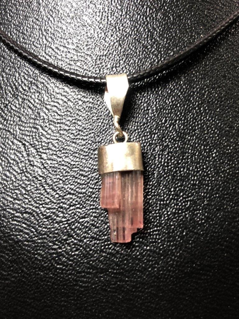 Pink Tourmaline Raw Crystal Pendant in Sterling Silver | Natural Gemstone Jewelry: Celebrate the natural beauty of gemstones with this exquisite Pink Tourmaline Raw Crystal Pendant in Silver. Expertly handcrafted, this pendant showcases a genuine uncut Pink Tourmaline crystal, prese