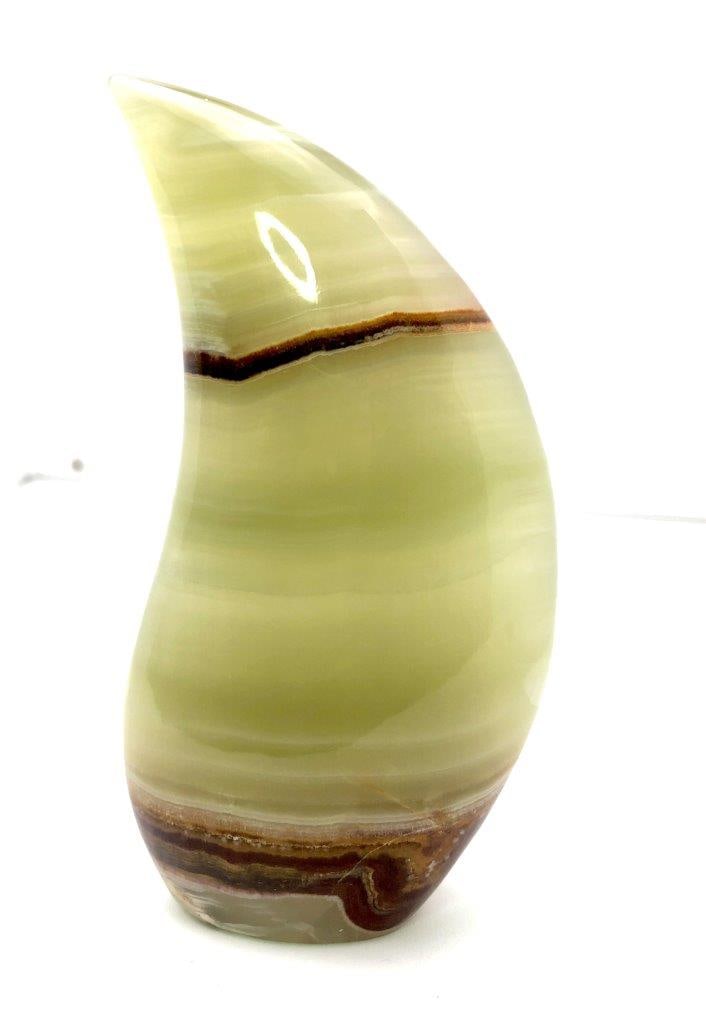 Carved Onyx Tumble Polished Banded Stone Decorative Object Freefoam Standing Tumble: This striking carved onyx tumble features a freeform standing design that showcases the natural beauty of banded onyx. Expertly polished, the stone highlights its layered patterns and rich tonal varia