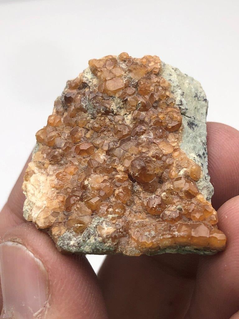 Natural Garnet Crystal Cluster ? 10g Raw Garnet Mineral Specimen for Collection & Display: This beautiful 10-gram natural garnet crystal cluster is a stunning mineral specimen featuring rich, deep red garnet crystals formed naturally in the earth. The raw crystal formation highlights the na
