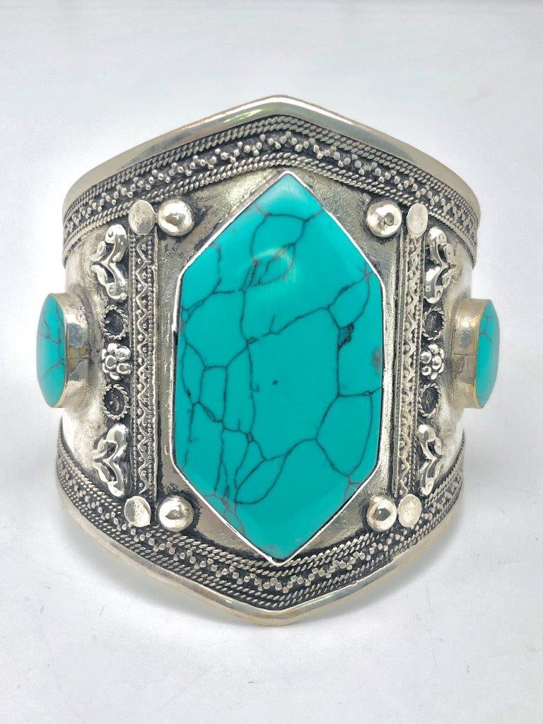 Chinese Turquoise Brass Bangle Bracelet ? Natural Stone Accents ? Vintage Ethnic Jewelry: Offered is a striking Chinese turquoise and brass bangle bracelet accented with round natural turquoise stones. The vibrant cabochons display characteristic matrix veining and tonal variation, ranging