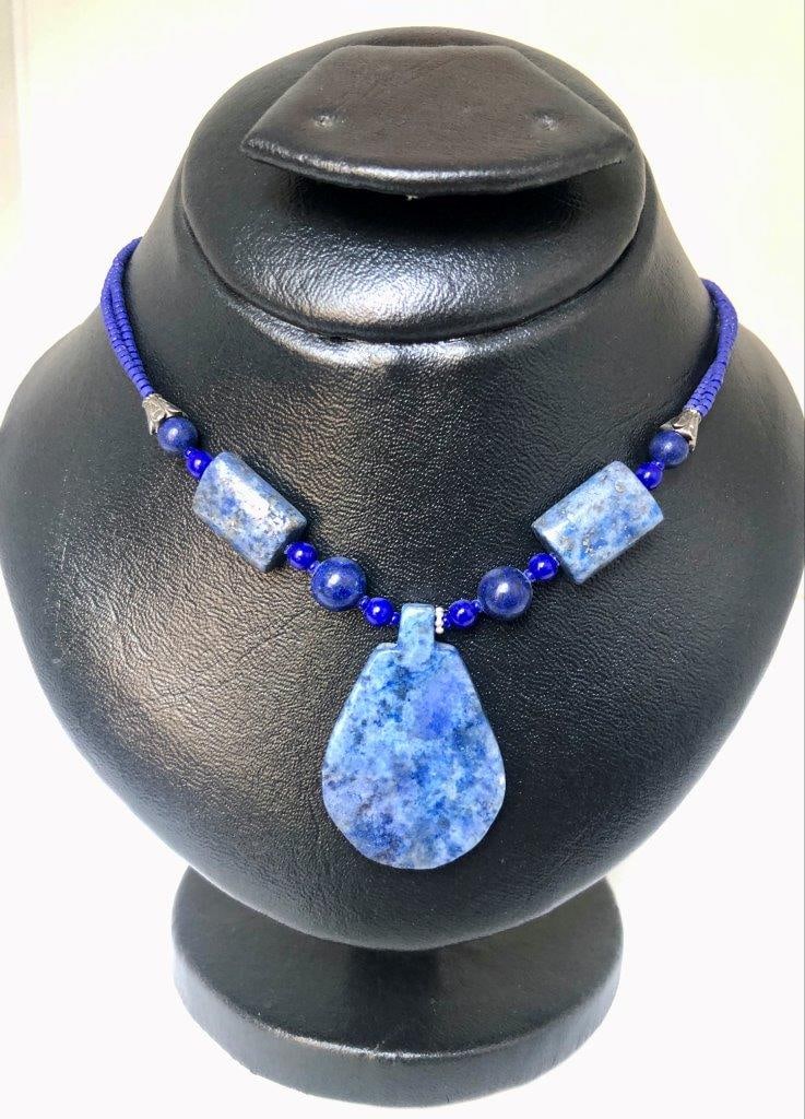Handmade Lapis Lazuli Necklace ? Natural Blue Gemstone ? Vintage Estate Jewelry: an elegant hand carved lapis lazuli necklace showcasing the rich royal blue coloration for which this gemstone is prized. The stone displays natural variations and may show subtle pyrite inclusions, a