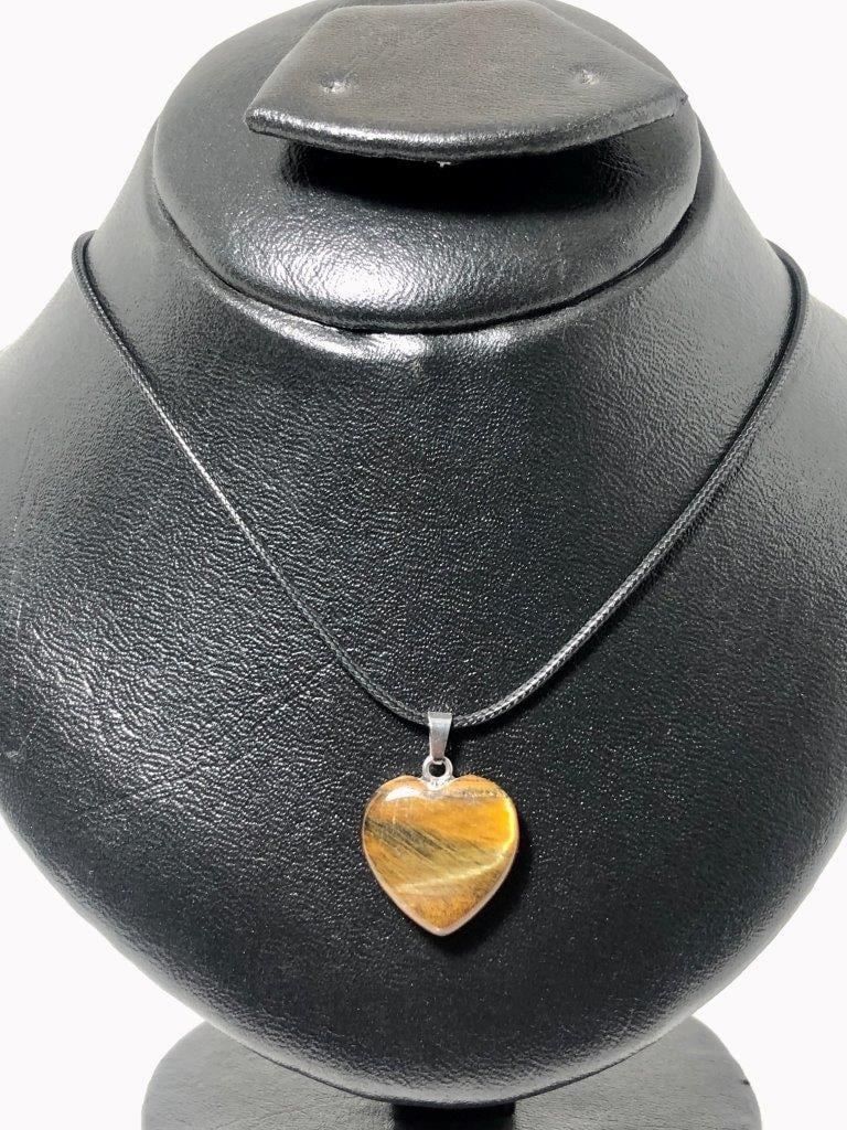Tiger Eye Heart Pendant Natural Crystal Jewelry for Courage & Balance: Carry strength and grounding energy with this tiger eye heart pendant. Crafted from natural tiger eye stone, each pendant showcases the stone?s rich golden-brown hues and chatoyant shimmer, making eve