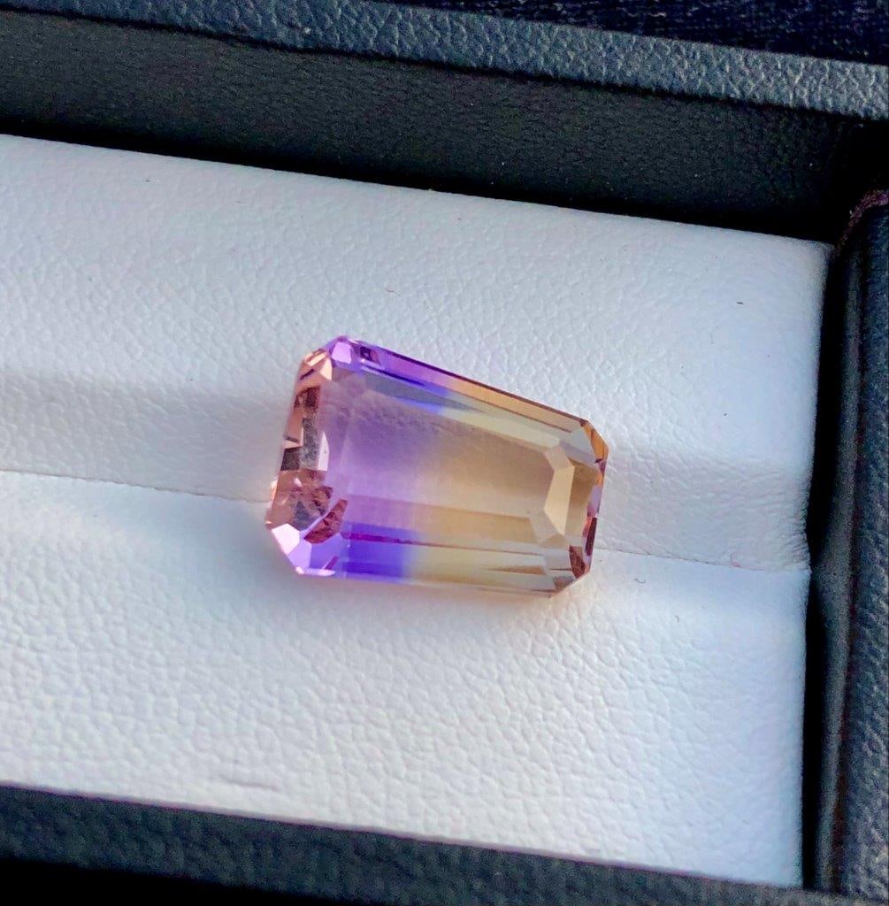 8.15 Carats Natural Bi Color Ametrine - 15X11X7 mm: 8.15 Carats Natural Bi Color Ametrine - 15X11X7 mmShipping Rate: $15.00 .shipping rates are determined by Parcel weight and destination.Combined shipping: We offer combine shipping on multiple items p