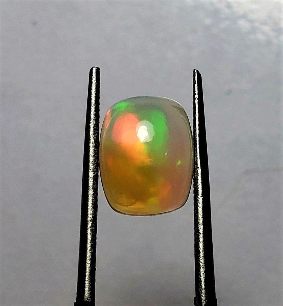 Fire Ethopian Opal - 2 Carats: Fire Ethopian Opal - 2 CaratsShipping Rate: $15.00 .shipping rates are determined by Parcel weight and destination.Combined shipping: We offer combine shipping on multiple items purchased to reduce