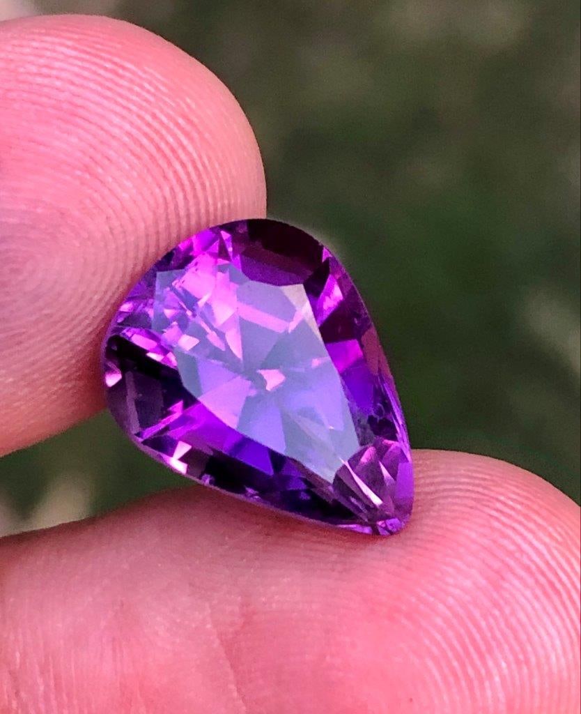 6.70 Cts Amethyst Loose Gemstone Pear Shape - 14X11X9 mm: Stunning 6.70 Cts Amethyst Loose Gemstone Pear Shape - 14X11X9 mm, this natural February birthstone is ideal for custom rings, pendants, luxury jewelry designs, gemstone collections, or meaningful gif