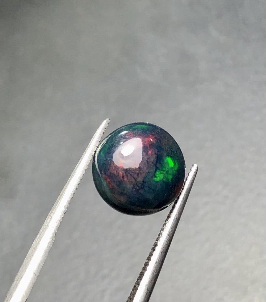 1.45 Carats Round Cut Natural Black Opal - 9X9X4 mm: 1.45 Carats Round Cut Natural Black Opal - 9X9X4 mm Shipping: