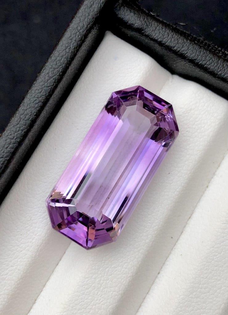 25.00 Carats Emerald Cut Natural Amethyst Purple Color - 27X13X10 mm: 25.00 Carats Emerald Cut Natural Amethyst Purple Color - 27X13X10 mmShipping Rate: $15.00 .shipping rates are determined by Parcel weight and destination.Combined shipping: We offer combine shipping o