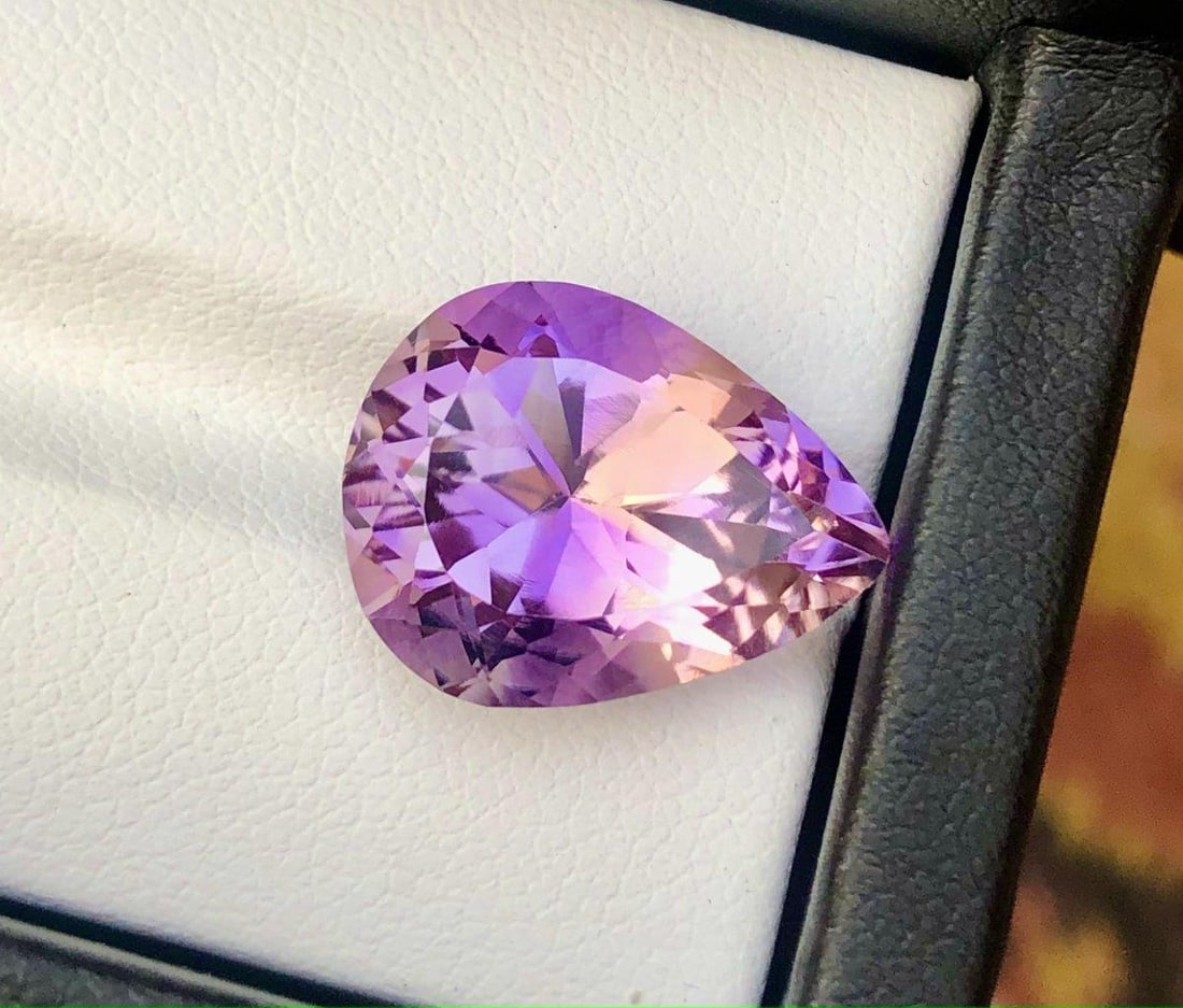Top Quality Natural Ametrine - 10.25 Carats - 17X13X9 mm: Shipping Rate: $15.00 .shipping rates are determined by Parcel weight and destination.Combined shipping: We offer combine shipping on multiple items purchased to reduce shipping cost.