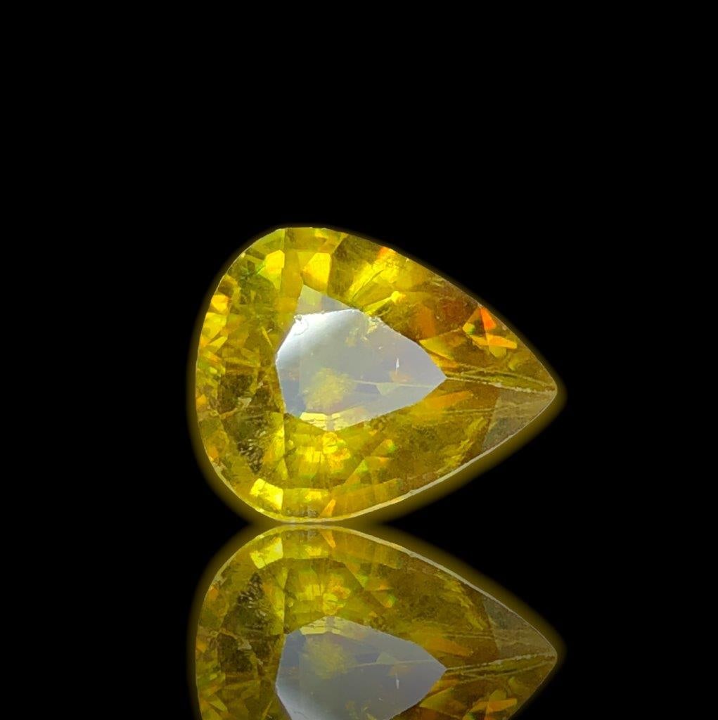 Fine Quality Pear Shape Fire Sphene - 3.50 Carats - 11X9X6 mm: Fine Quality Pear Shape Fire Sphene - 3.50 Carats - 11X9X6 mmShipping Rate: $15.00 .shipping rates are determined by Parcel weight and destination.Combined shipping: We offer combine shipping on multi