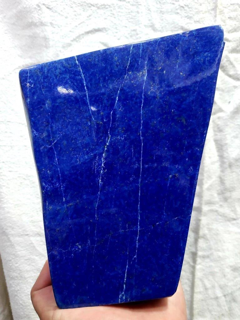 2.7 Kg Lapis Lazuli Healing Standing Tumble: 2.7 Kg Top Quality Lapis Lazuli Healing Standing Tumble -180X162X40 mmShipping Rate: $95.00 .shipping rates are determined by Parcel weight and destination.Combined shipping: We offer combine shipping