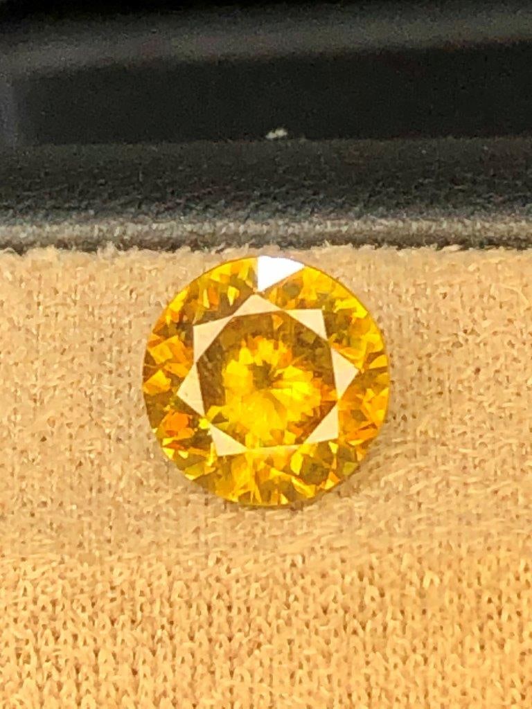 1.35 Carats Top Grade Fire Sphene ? Natural Gemstone: This listing features a top-grade natural Fire Sphene gemstone weighing 1.35 carats, prized for its exceptional brilliance and vibrant fire. Sphene is known for its high dispersion, often exceeding th