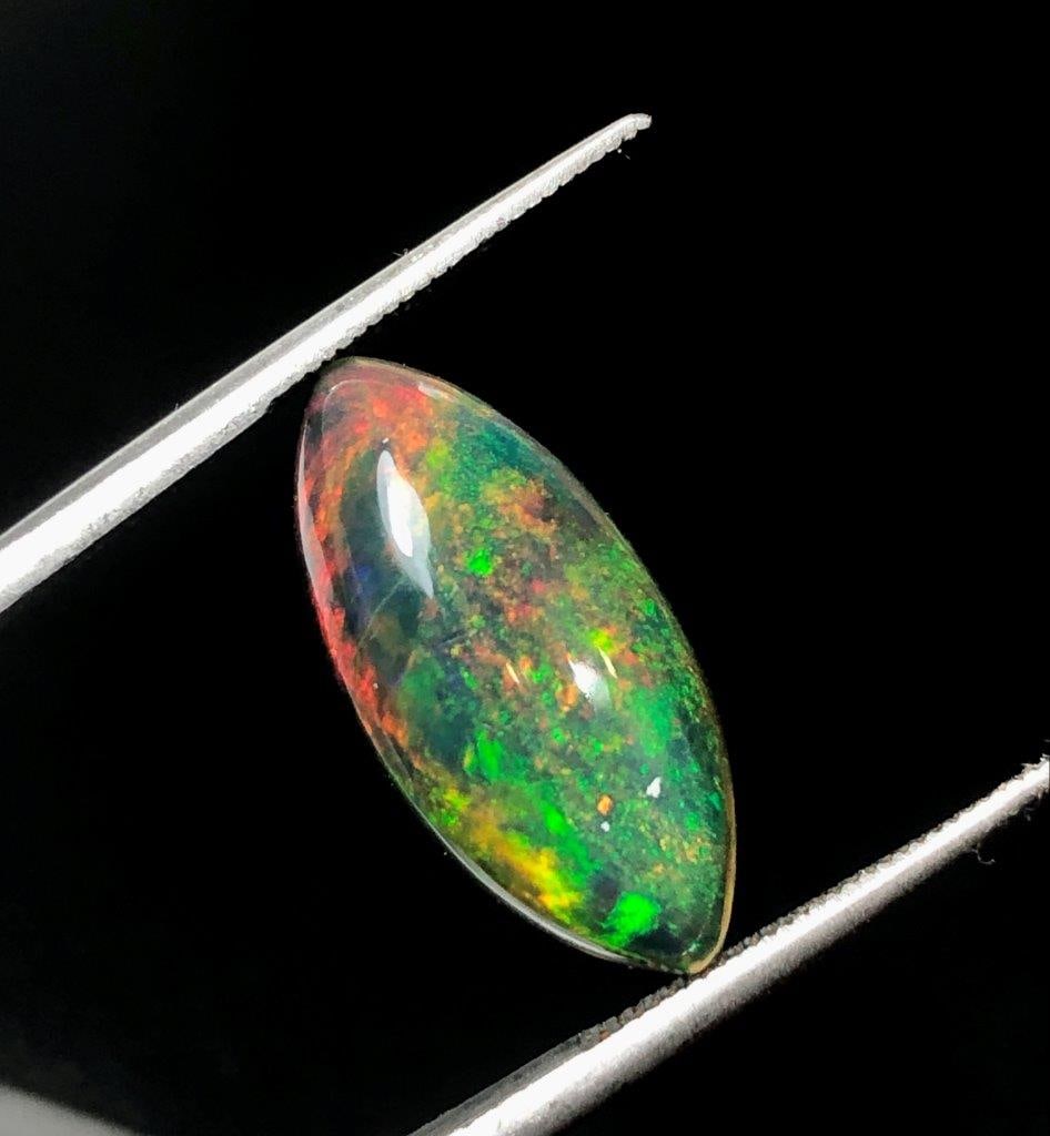 3.35 Carats Genuine Black Fire Opal Gemstone ? Perfect for Custom Rings & Pendants - 18X9X5 mm: 3.35 Carats Genuine Black Fire Opal Gemstone ? Perfect for Custom Rings & Pendants - 18X9X5 mmShipping Rate: 23$ WorldWideshipping rates are determined by Parcel weight and destination.Combined shippi