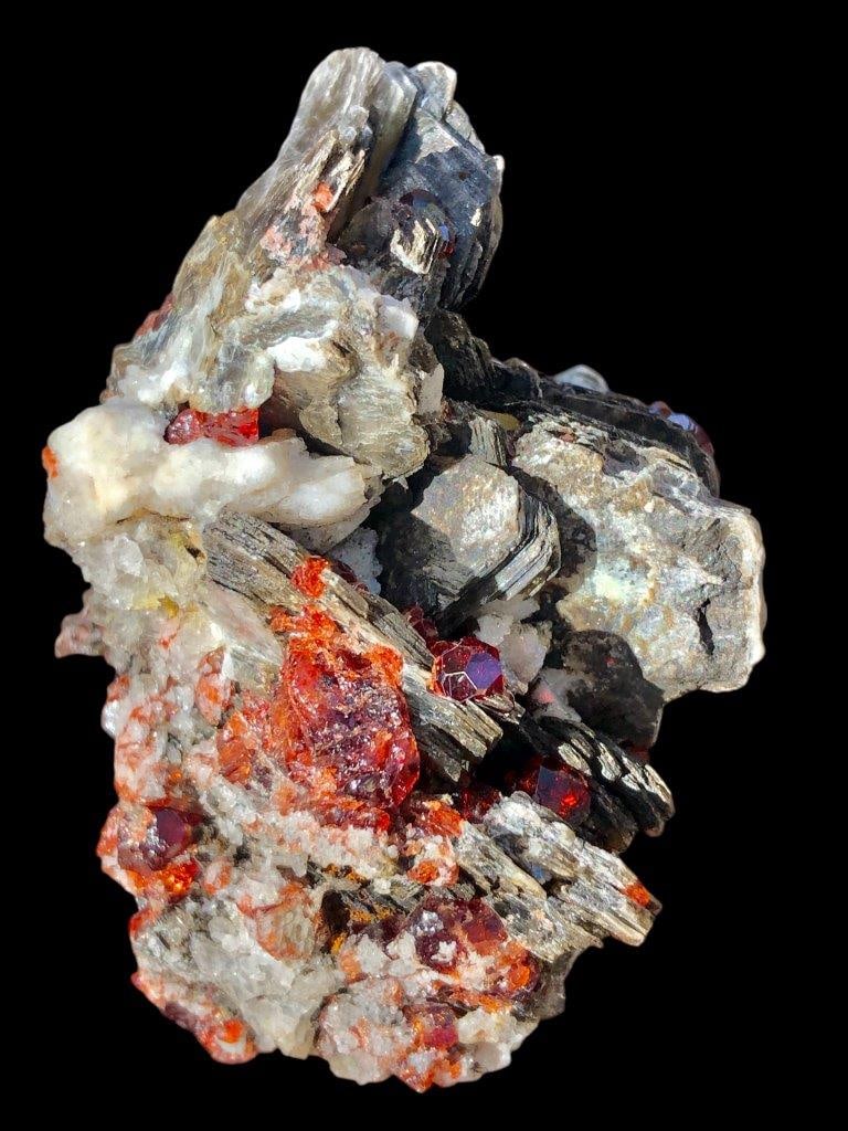 Spessartine Garnet With Mica Mineral Specimen 138 Grams - 75X60X58 mm: Spessartine Garnet With Mica Mineral Specimen 138 Grams - 75X60X58 mm Shipping Rate: FREE SHIPPING .shipping rates are determined by Parcel weight and destination.Combined shipping: We offer combine s