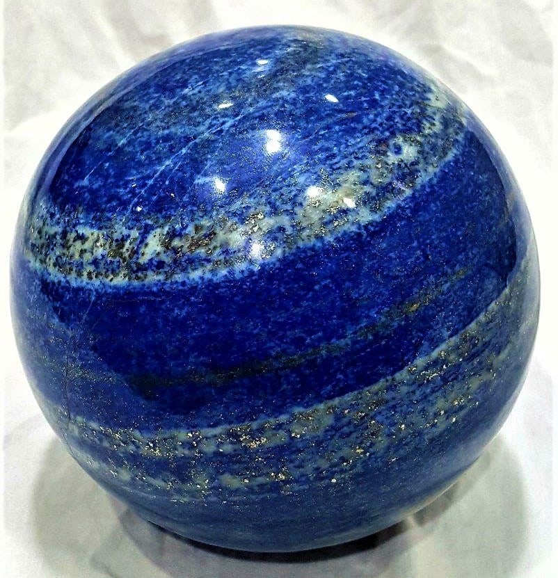 Lapis Lazuli Sphere - 5.9 KG: Lapis Lazuli Sphere - 5.9 KGShipping Rate: $150.00 .shipping rates are determined by Parcel weight and destination.Combined shipping: We offer combine shipping on multiple items purchased to reduce sh