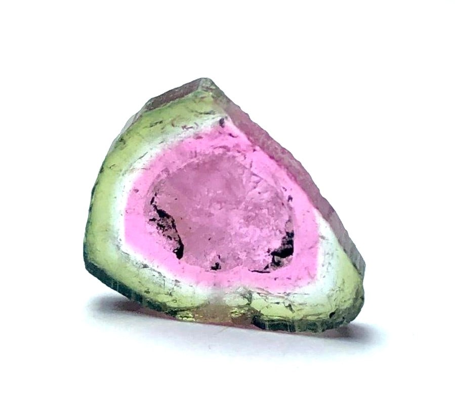 4.60 Carats Natural Watermalon Tourmaline Slice: 4.60 Carats Natural Watermalon Tourmaline SliceShipping Rate: $20.00 .shipping rates are determined by Parcel weight and destination.Combined shipping: We offer combine shipping on multiple items purc