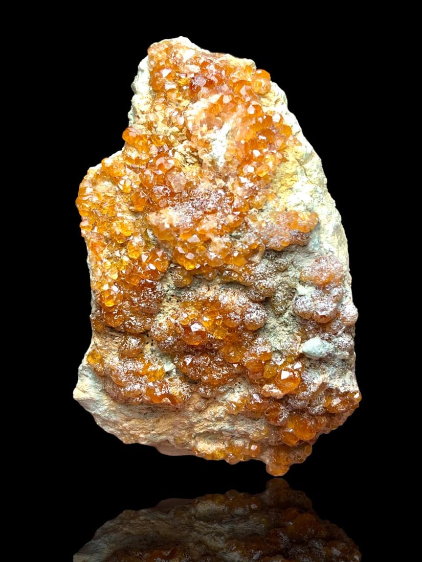 Hessonite Garnet Mineral Specimen - 70 Grams: Hessonite Garnet Mineral Specimen - 70 GramsShipping Rate: $23.00 .shipping rates are determined by Parcel weight and destination.Combined shipping: We offer combine shipping on multiple items purchas