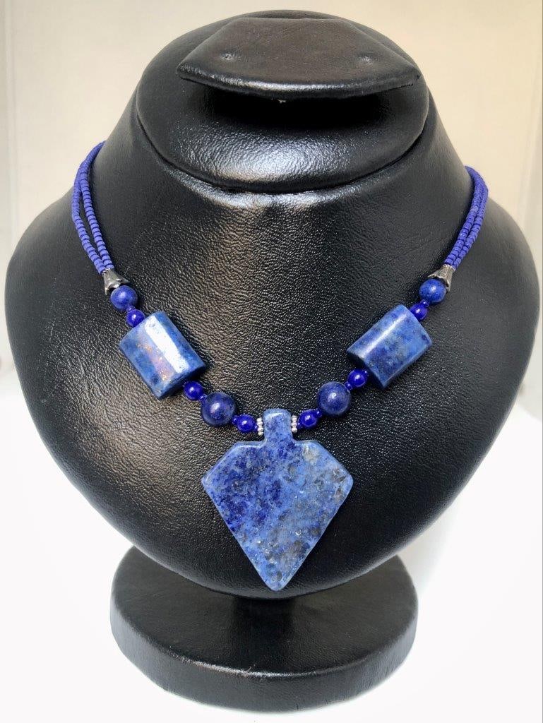 Hand Carved Lapis Lazuli Necklace ? Natural Blue Gemstone ? Vintage Estate Jewelry: an elegant hand carved lapis lazuli necklace showcasing the rich royal blue coloration for which this gemstone is prized. The stone displays natural variations and may show subtle pyrite inclusions, a