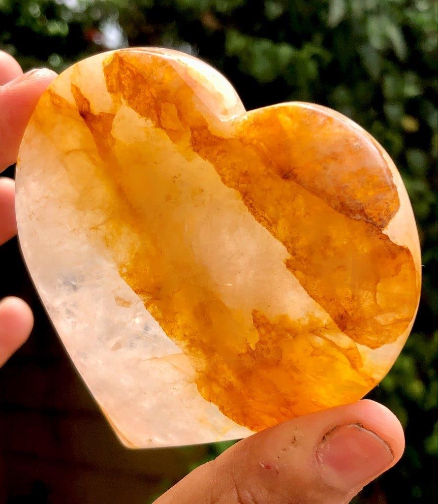 200g Fire Hematoid Quartz Heart ? Natural Polished Healing Crystal ? Red Inclusion Quartz Stone,: Weight: 200 gramsMaterial: Natural Fire Hematoid QuartzShape: HeartColor: Clear quartz with red/fiery hematite inclusionsFinish: Smooth polishedPerfect for:Home and office d?corMeditation and energy h