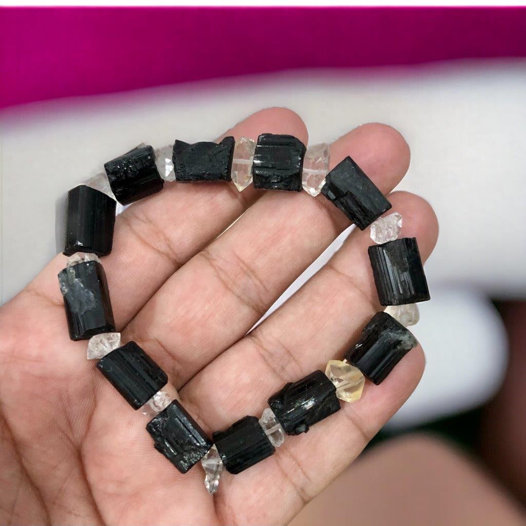 Black Tourmaline And Quartz Beaded Bracelet: Black Tourmaline And Quartz Beaded Bracelet Shipping: Domestic: Flat-rate of 23$ to anywhere within the contiguous U.S.International: Foreign shipping rates are determined by destination.