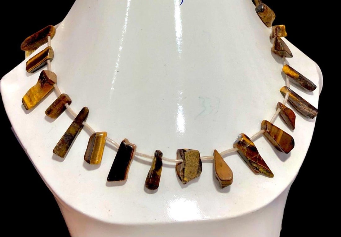 Amazing Tiger Eye Necklace: Amazing Tiger Eye Necklace Shipping Rate: $23.00 .shipping rates are determined by Parcel weight and destination.Combined shipping: We offer combine shipping on multiple items purchased to reduce ship