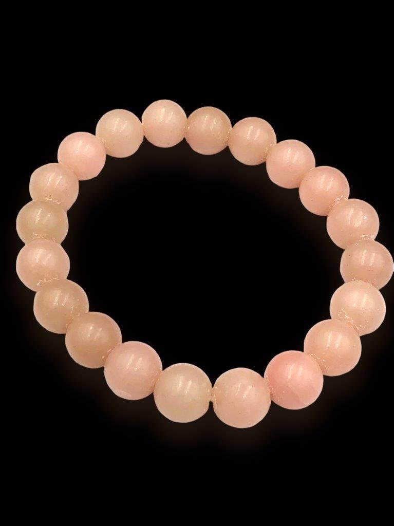 Rose Quartz Beaded Bracelet - Healing Jewelry: Rose Quartz Beaded Bracelet - Healing JewelryShipping Rate: $23.00 .shipping rates are determined by Parcel weight and destination.Combined shipping: We offer combine shipping on multiple items