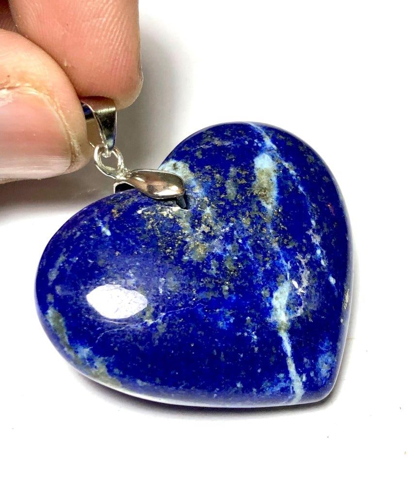 Heart Shape Lapis Lazuli Pendant: Heart Shape Lapis Lazuli PendantShipping Rate: $45.00 .shipping rates are determined by Parcel weight and destination.Combined shipping: We offer combine shipping on multiple items purchased to reduce