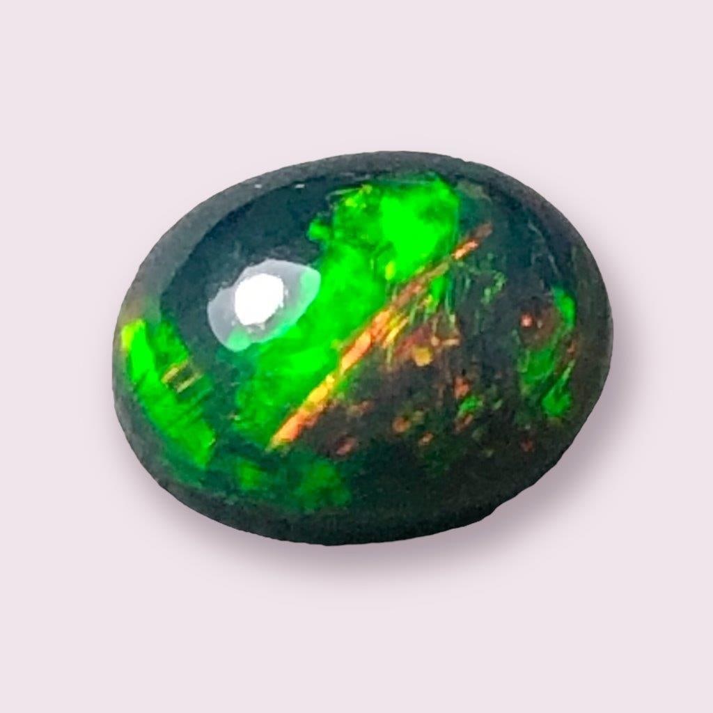 1.80 Carats Fire Black Opal - 11X7X4 mm: 1.80 Carats Fire Black Opal - 11X7X4 mmShipping Rate: $15.00 .shipping rates are determined by Parcel weight and destination.Combined shipping: We offer combine shipping on multiple items purchased to