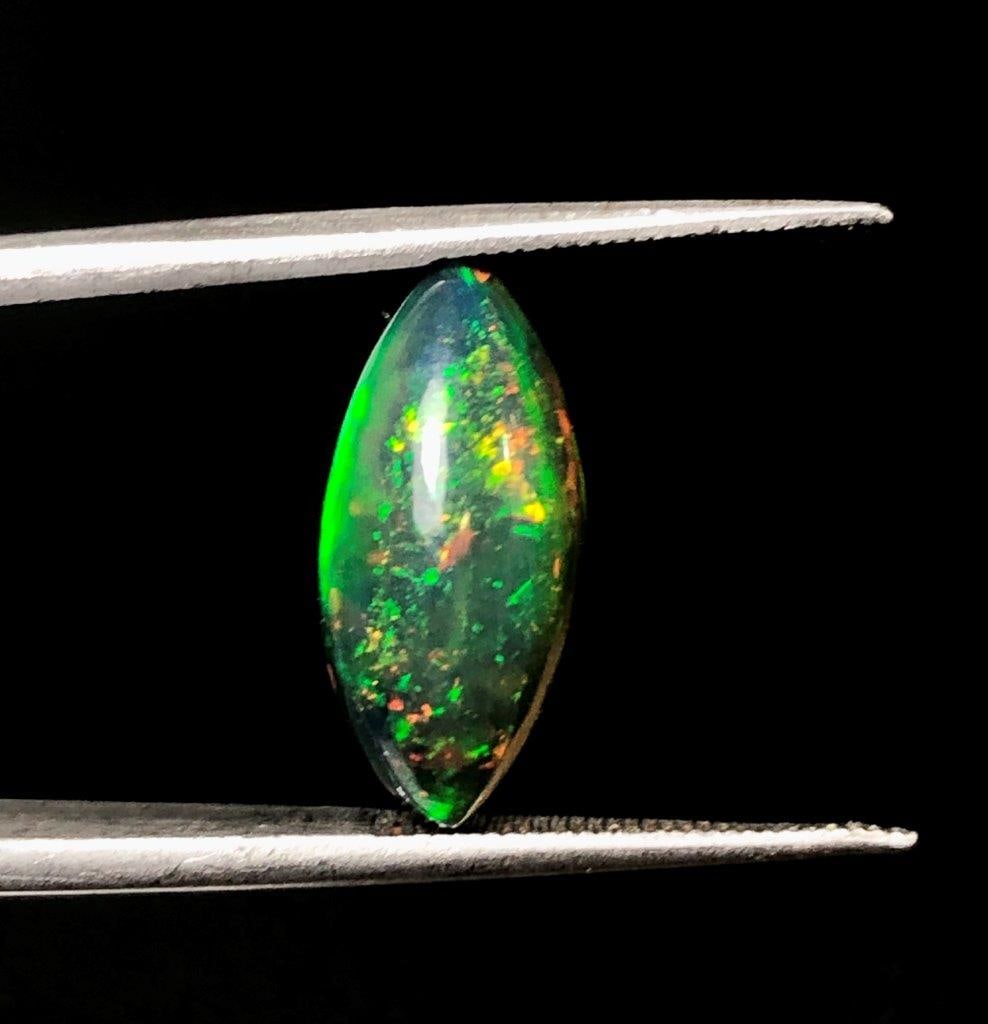 3.15 Carats AAA Black Fire Opal Loose Gemstone ? Fine Jewelry Quality - 16X8X6 mm: 3.15 Carats AAA Black Fire Opal Loose Gemstone ? Fine Jewelry Quality - 16X8X6 mmShipping Rate: 23$ WorldWideshipping rates are determined by Parcel weight and destination.Combined shipping: We offer 