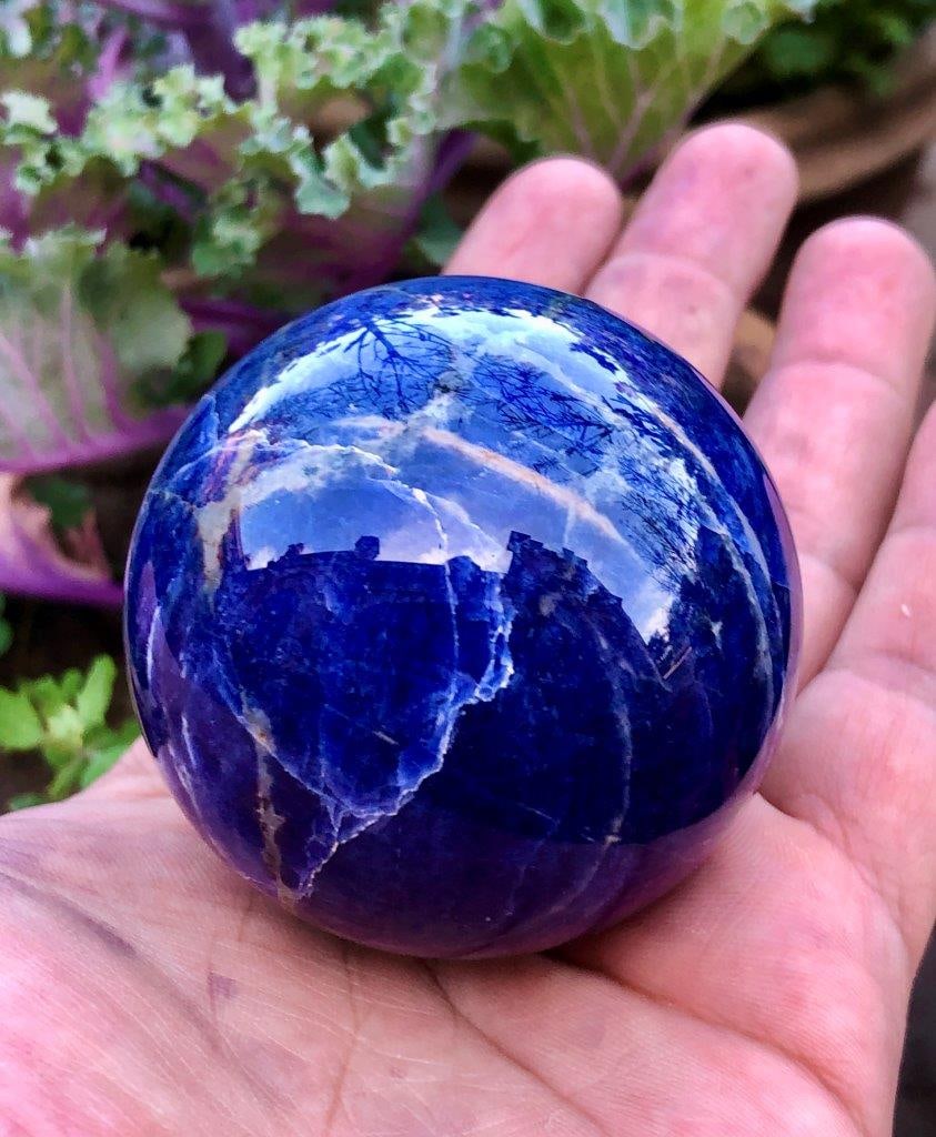 Deep Blue Afghanite Sphere ? 230g Natural Crystal Ball, 56 mm Polished Mineral Specimen: Discover the striking beauty of this Deep Blue Afghanite Sphere, a rare and eye-catching mineral specimen prized for its rich blue coloration and natural patterns. Expertly polished into a smooth sphe