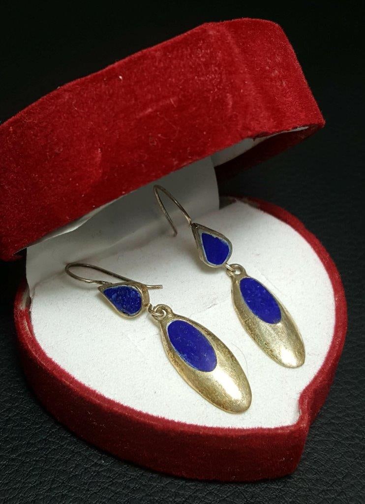 Natural Lapis Lazuli Earrings in Silver: Natural Lapis Lazuli Earrings in Silver Shipping: $23.00. Shipping rates are determined by Parcel weight and destination.