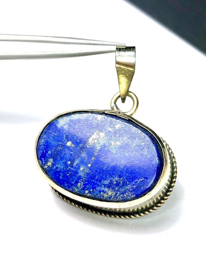 Madani Lapis Lazuli from Afghanistan Pendant: Madani Lapis Lazuli from Afghanistan Pendant Shipping: $23.00. Shipping rates are determined by Parcel weight and destination.