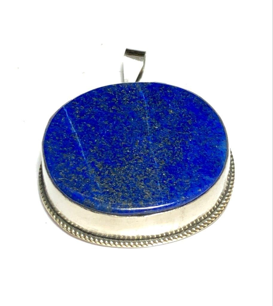 Lapis Lazuli Pendant, Pendant, September Birthstone: Lapis Lazuli Pendant, Pendant, September Birthstone Shipping: $23.00. Shipping rates are determined by Parcel weight and destination.