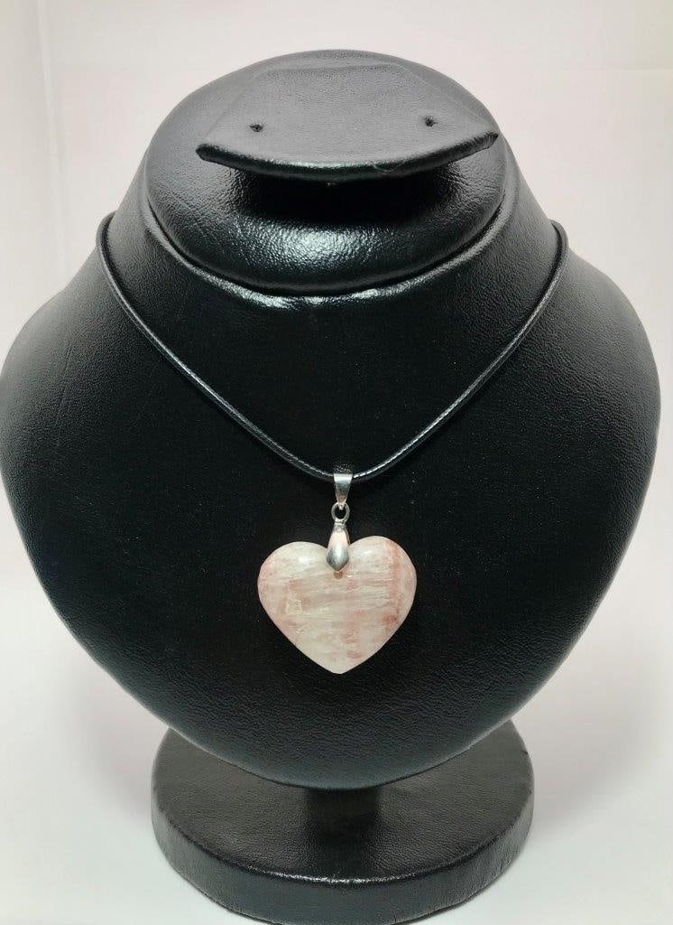 Natural Pink Calcite Heart Necklace Unique Crystal Pendant: Natural Pink Calcite Heart Necklace Unique Crystal Pendant Shipping: $23.00. Shipping rates are determined by Parcel weight and destination.