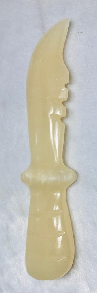 Honey Calcite Knife - 72.1G: Honey Calcite Knife - 135X 26 - 72.1G Shipping: $23.00. Shipping rates are determined by Parcel weight and destination.