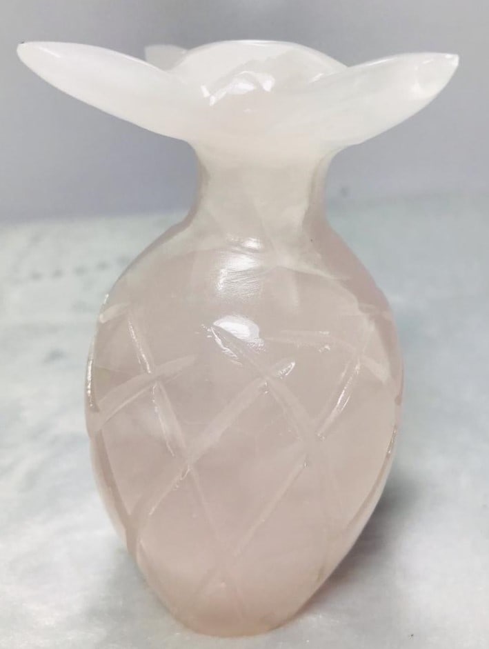 Calcite stone decoration piece pinkish shade - 436G: Calcite stone decoration piece pinkish shade - 106X56mm - 436G Shipping: $45.00. Shipping rates are determined by Parcel weight and destination.