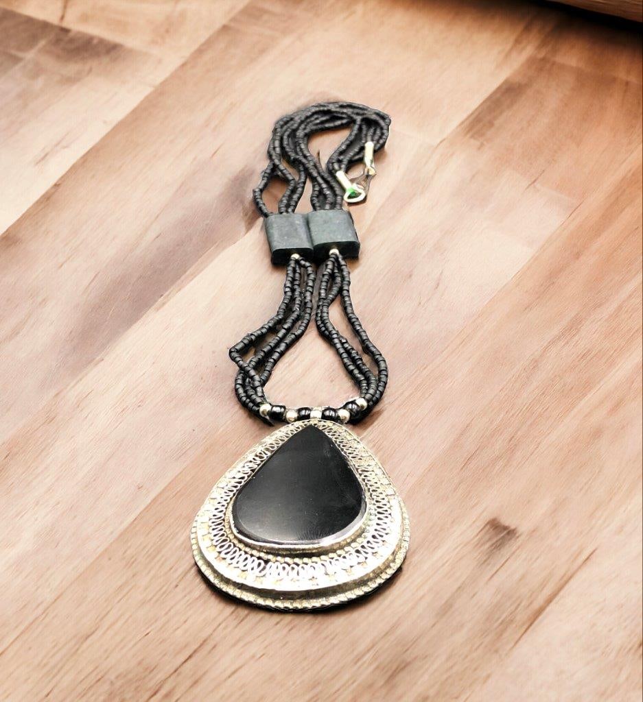 Black Agate Charm Necklace - Handmade Jewelry: Black Agate Charm Necklace - Handmade Jewelry Shipping: $23.00. Shipping rates are determined by Parcel weight and destination.