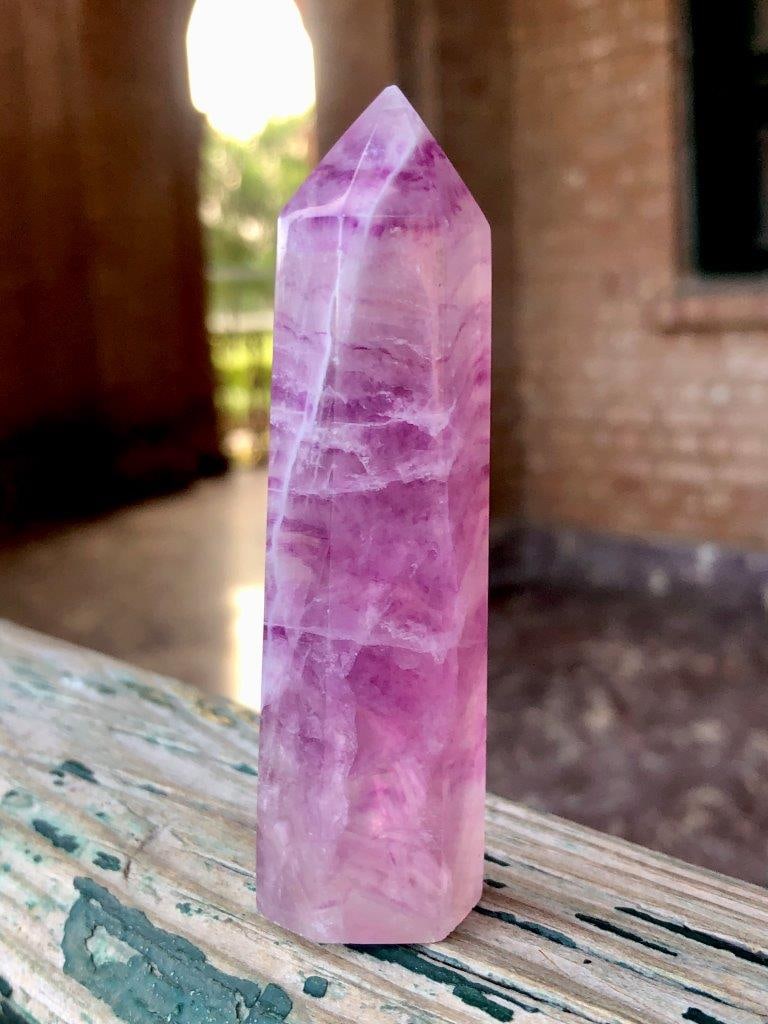 Rainbow Fluorite Crystal Tower ? 120g Statement Piece, 8.5 cm Polished Obelisk Healing Stone: Make a bold impression with this Rainbow Fluorite Crystal Tower, a stunning statement piece showcasing vibrant bands of green, purple, and translucent hues. Expertly polished into a classic obelisk sh