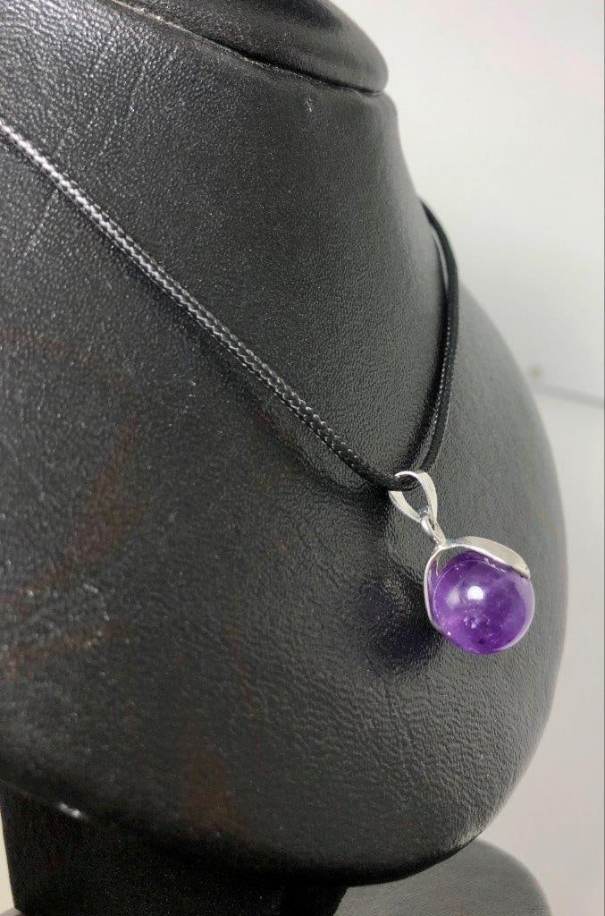 Single Amethyst Bead Pendant ? Minimalist Gemstone Necklace: Embrace simplicity and natural beauty with this single amethyst bead pendant. Featuring a polished amethyst bead, this pendant captures the stone?s calming and protective energies in a minimalist desi