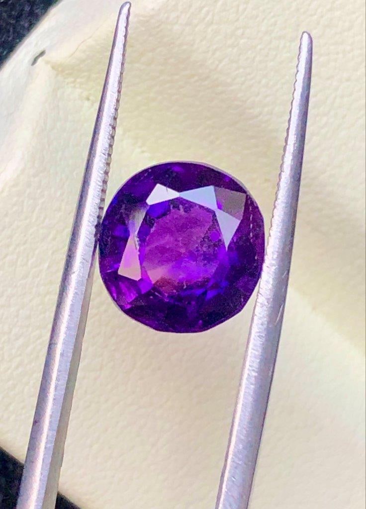 3.50 Cts Natural Amethyst Loose Stone - 9X9X7 mm: Add a touch of regal elegance to your next jewelry design with this exquisite 3.50 Carat Natural Amethyst Loose Gemstone. Measuring a perfectly balanced 9x9 mm with a substantial 7 mm depth, this face