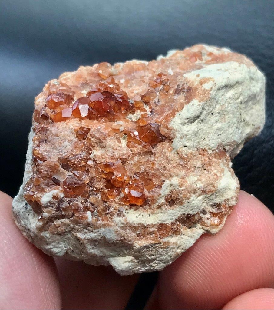 21.90 GRAMS Spessartite Garnet Mineral - SPECIMEN - 29X38.5X18 mm: 21.90 GRAMS Spessartite Garnet Mineral - SPECIMEN - 29X38.5X18 mmShipping Rate: 23$shipping rates are determined by Parcel weight and destination.Combined shipping: We offer combine shipping on multip